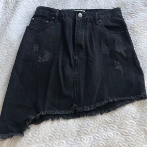 Distressed asymmetrical skirt